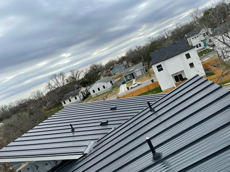 Standing seam metal roof panels with vents for Skylight Repair in River Falls